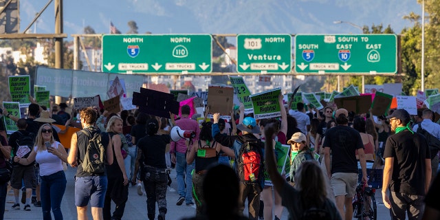 Protesters march northbound on the 110 Freeway to denounce the Supreme Court's decision in the Dobbs v Jackson Women's Health case on June 24, 2022 in Los Angeles, California. 