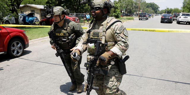 On May 24, 2022, law enforcement officers fled a suspected shooting scene near Robb Elementary School in Uvalde, Texas, USA.