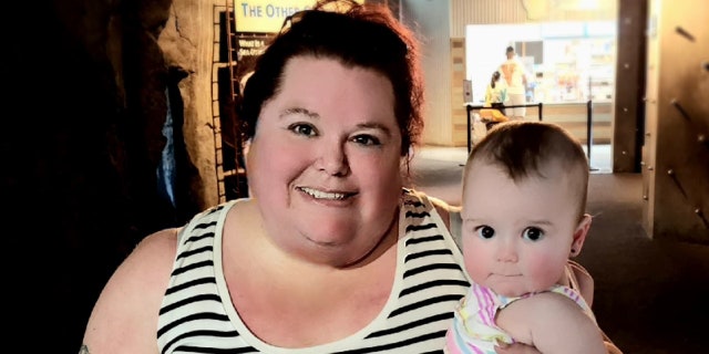 Leann Westman of Baton Rouge poses with her 11-month-old daughter. Westman said she will do all she can to help other parents who are struggling with the baby formula shortage in America.