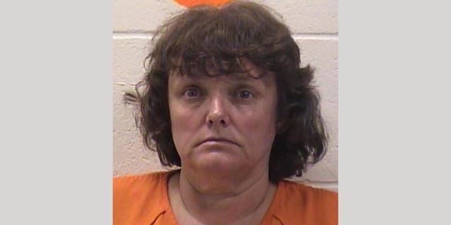 Lee Ann Daigle, 58, was arrested Monday and charged with the murder of her newborn baby in 1985. 