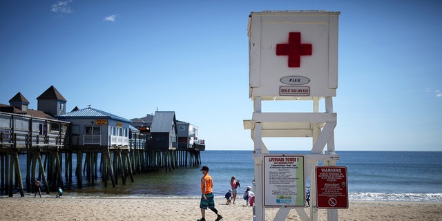 The lifeguard chair is empty at Old Orchard Beach in Maine on Sept. 7, 2021. (Ben McCanna/Portland Press Herald via Getty Images)