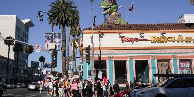 A crowd gathers to protest the U.S. Supreme Court opinion overturning of Roe v. Wade on June 24, 2022 on Hollywood Boulevard. (Photo by Emily Molli/Anadolu Agency via Getty Images)