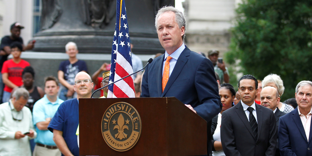 Louisville Mayor Greg Fischer orders all flags in Louisville to be lowered to half staff in honor of Muhammad Ali, the former world heavyweight boxing champion after he died at the age of 74 on Friday at City Hall in Louisville, Kentucky, U.S. June 4, 2016. REUTERS/John Sommers II