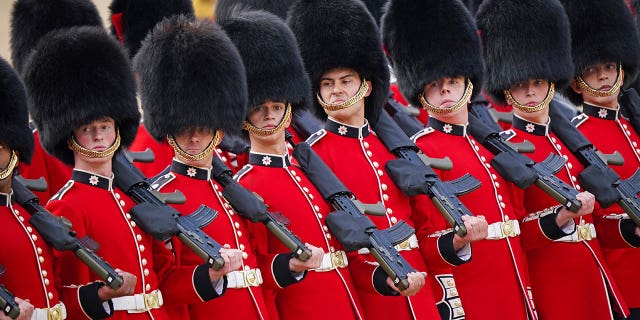 Members of the Household Division march during the Trooping the Colour ceremony at Horse Guards Parade.