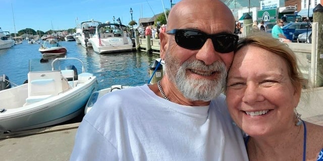 In this photo released by the U.S. Coast Guard, Yanni Nikopoulos, left, is pictured with Dale Jones. The U.S. Coast Guard is searching for the pair reported overdue after they failed to return when expected from a sailing trip to Portugal’s Azores.