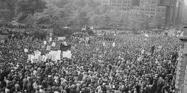 An enormous crowd gathered in Madison Square Park on D-Day in New York City on June 6, 1944.