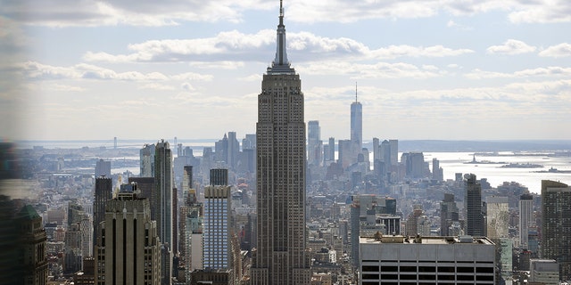 The Empire State Building towers above other largely empty office buildings on March 4, 2021, in New York City.