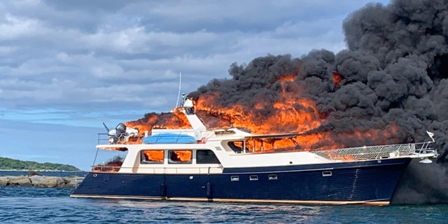 The passengers jumped overboard after seeing black smoke below deck. 