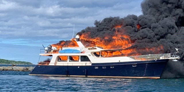 The passengers jumped overboard after seeing black smoke below deck.
