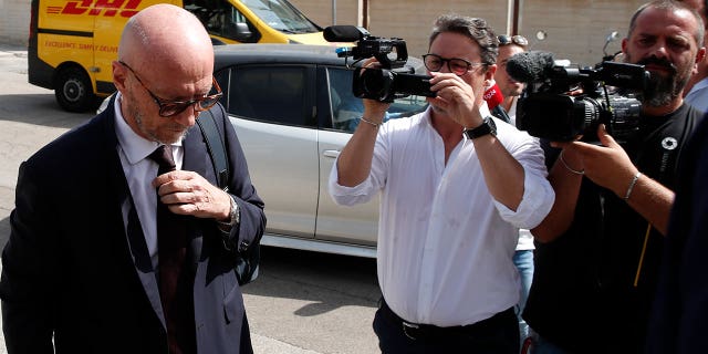 Canadian-born film director Paul Haggis arrives at Brindisi law court in southern Italy, Wednesday, June 22, 2022, to be heard by prosecutors investigating a woman's allegations he had sex with her without her consent over the course of two days. Under Italian law, a judge, after hearing arguments from both prosecutors and defense lawyers, will rule on whether Haggis can be set free pending possible additional investigation. (AP Photo/Salvatore Laporta)