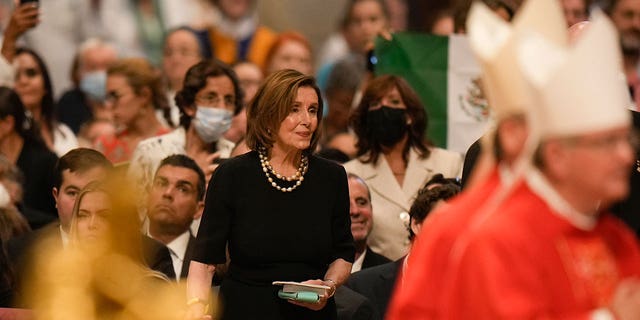 Speaker of the House Nancy Pelosi, D-Calif., looks at Pope Francis as he celebrates a Mass on the Solemnity of Saints Peter and Paul, in St. Peter's Basilica at the Vatican, Wednesday, June 29, 2022.