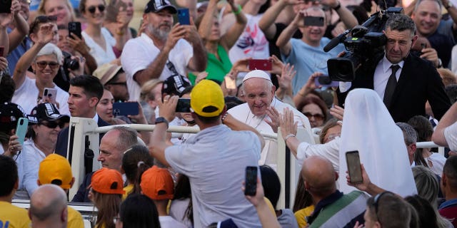 Pope Francis arrives in St. Peter's Square at the Vatican for the participants into the World Meeting of Families in Rome, Saturday, June 25, 2022. The World Meeting of Families was created by Pope John Paul II in 1994 and celebrated every three years since then in different cities. (AP Photo/Andrew Medichini)