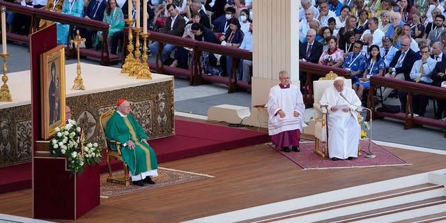 Pope Francis presides over a mass celebrated by U.S. Cardinal Kevin Joseph Farrell in St. Peter's Square at the Vatican for the participants into the World Meeting of Families in Rome, Saturday, June 25, 2022. The World Meeting of Families was created by Pope John Paul II in 1994 and celebrated every three years since then in different cities. (AP Photo/Andrew Medichini)