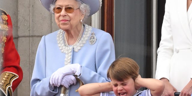 Queen Elizabeth II and Prince Louis during Trooping the Colour on June 2, 2022, in London.