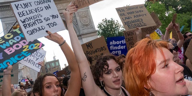 Pro-choice protestors carry signs in New York City following a Supreme Court decision to overturn Roe v. Wade. (Credit: John Mantel for Fox News Digital)