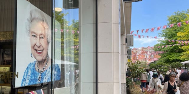 A print of Queen Elizabeth II in a London shop window during Jubilee celebrations.