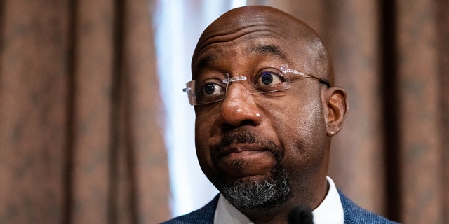 Sen. Raphael Warnock, D-Ga., questions Treasury Secretary Janet Yellen during a Senate Banking, Housing, and Urban Affairs Committee hearing, in the Dirksen Senate Office Building in Washington May 10, 2022 in Washington, DC. (Photo by Tom Williams-Pool/Getty Images) 