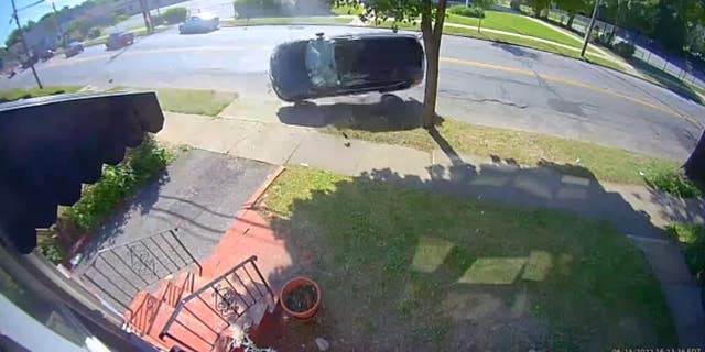 The vehicle rolls down the street before it crashes into a tree and skids to a halt, the video appears to show. 