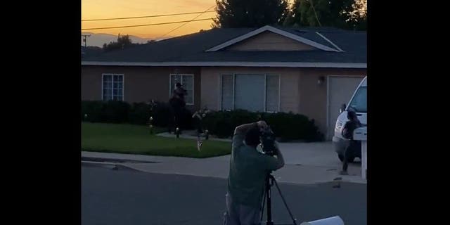 Video taken by neighbor David Burgett shows law enforcement officers executing a search warrant at the California home of Nicholas John Roske, who was charged Wednesday with attempted murder of Supreme Court Justice Brett Kavanaugh.