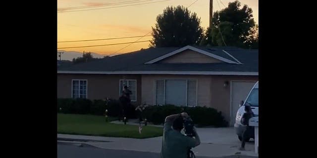 Video taken by neighbor, David Burgett, shows law enforcement officers executing a search warrant at the California home of Nicholas John Roske, who was charged last week with attempted murder of Supreme Court Justice Brett Kavanaugh.
