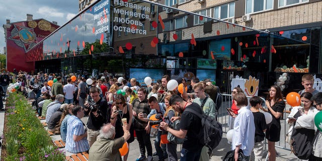 People line up to visit a newly-opened fast-food restaurant in a former McDonald's outlet on Bolshaya Bronnaya Street in Moscow Sunday, June 12, 2022.