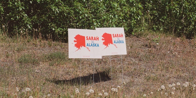 Signs in support of Sarah Palin stand on a corner in south Anchorage.