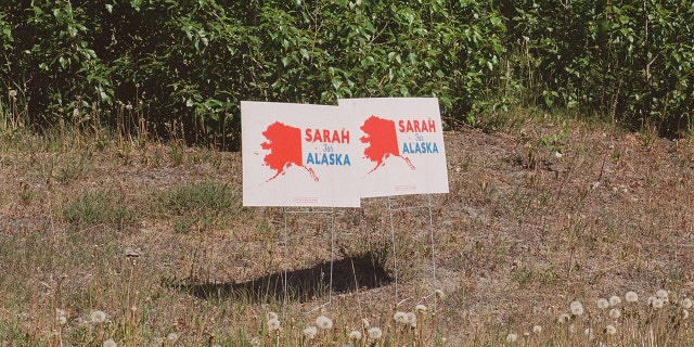 Signs in support of Sarah Palin stand on a corner in south Anchorage. 