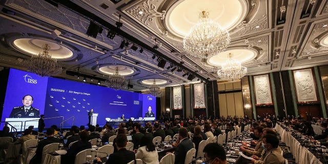 General Wei Fenghe, China's defense minister, speaks during the 19th International Institute for Strategic Studies Shangri-la Dialogue, Asia's annual defense and security forum, in Singapore, Sunday, June 12, 2022. 