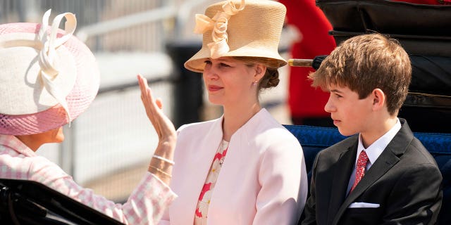 Viscount Severn and Lady Louise Windsor ride in a carriage as the royal procession leaves Buckingham Palace along The Mall heading for the Trooping the Color in London June 2, 2022, on the first of four days of celebrations to mark the Platinum Jubilee.