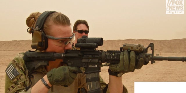 Shelene Etchison, one of the first women allowed in a combat role, trains in preparation for deployment.