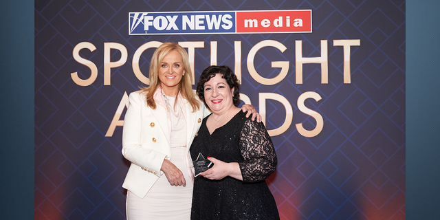 FOX News Media CEO Suzanne Scott and Mina Pertesis, The Five Producer and recipient of the Unsung Hero award.