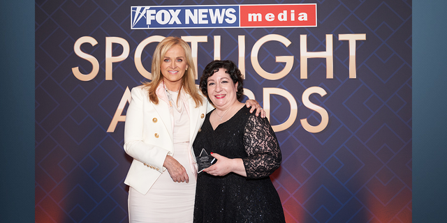 FOX News Media CEO Suzanne Scott and Mina Pertesis, The Five Producer and recipient of the Unsung Hero award.