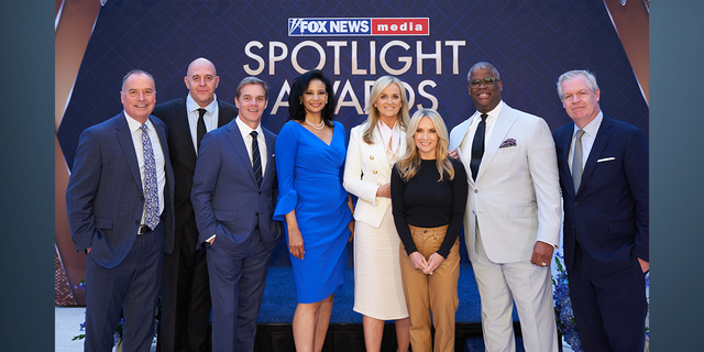 From left to right: Fox Corp and FOX News Media EVP of Human Resources Kevin Lord, Dragan Petrovic, Bill Hemmer, Lauren Green, FOX News Media CEO Suzanne Scott, Dana Perino, Charles Payne and FOX News President and Executive Editor Jay Wallace.