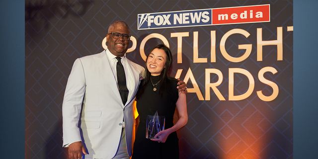 FOX Business Host Charles Payne and Evening Edit Executive Producer Joanna Chow who was awarded the Inclusion Ambassador of the Year.