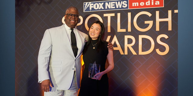 FOX Business Host Charles Payne and Evening Edit Executive Producer Joanna Chow who was awarded the Inclusion Ambassador of the Year.