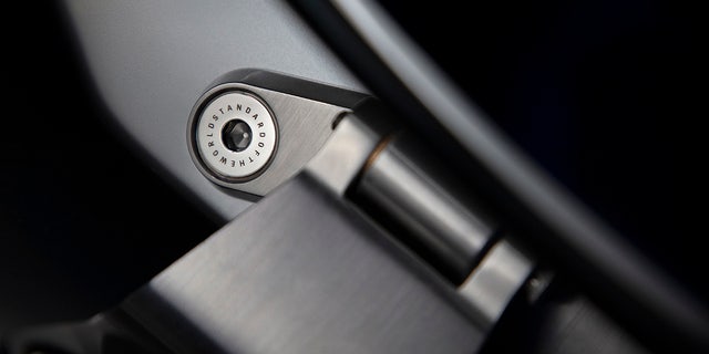 Door hinge on the Cadillac CELESTIQ show car. Show car images displayed throughout (not for sale).