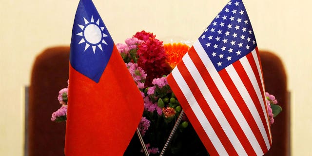 Flags of Taiwan and US are placed for a meeting in Taipei, Taiwan March 27, 2018.