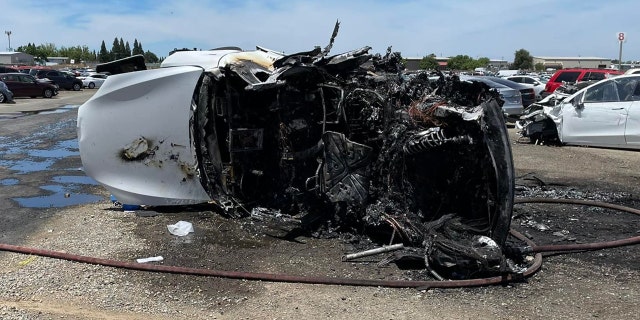 A Tesla burst into flames while sitting in a California junkyard earlier this month. 