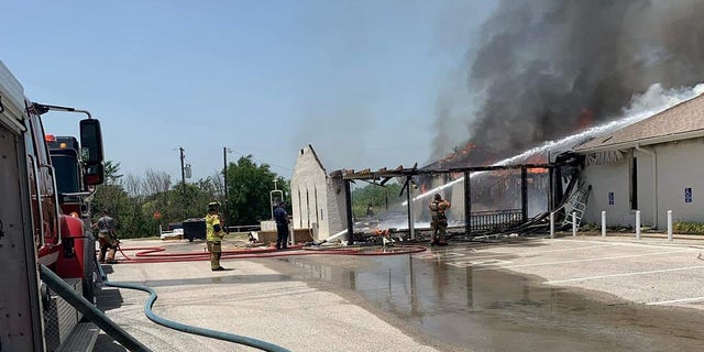 Firefighters worked to put out a fire that broke out at Balsora Baptist Church in Bridgeport, Texas, on Friday.