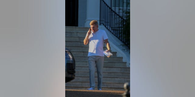 Todd Chrisley was seen talking on the phone and greeting his daughter after a jury found him and his wife, Julie Chrisley, guilty of all charges.