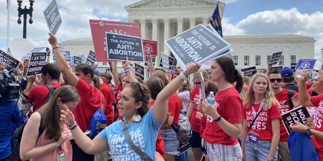 Pro-life activists react to the Supreme Court decision overruling Roe vs. Wade.