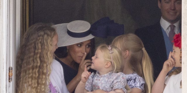 Meghan Markle playfully shushed a group of girls during the Trooping the Colour ceremony.