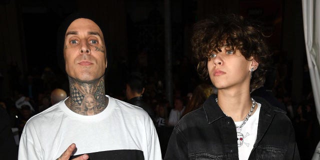 Travis Barker and Landon Asher Barker attend the premiere of Sony Pictures' "Jumanji: The Next Level" at TCL Chinese Theatre on December 09, 2019 in Hollywood, California.