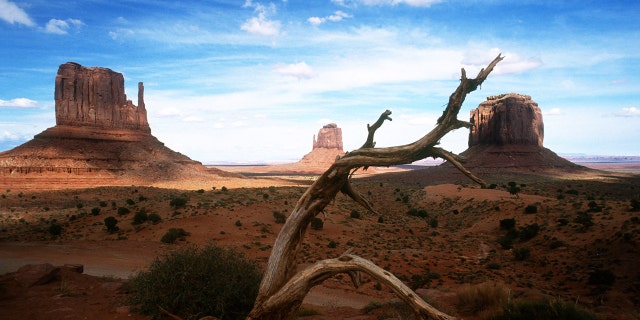 Scenic Monument Valley is located on the border of Aizona and Utah at the Monument Valley Navajo Tribal Park in Monument Valley, Arizona.