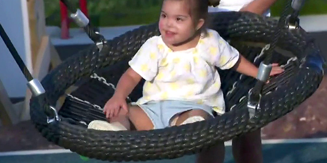 Rachel Campos-Duffy's daughter, Valentina, plays on a swing at the RWJBarnabas Field of Dreams playground in Toms River, N.J. (Fox News)