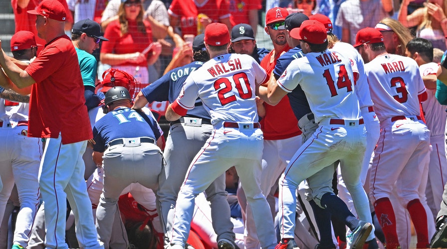 Angels, Mariners players brawl in 2nd inning; Raisel Iglesias throws sunflower seeds onto field