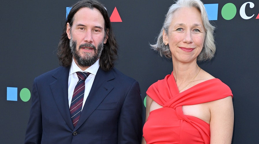 Keanu Reeves and girlfriend Alexandra Grant make rare red carpet appearance together holding hands