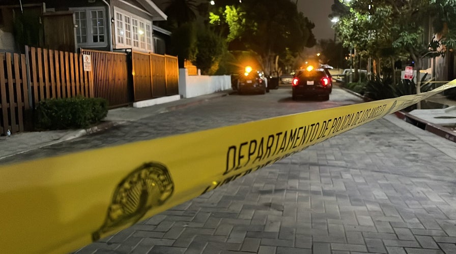 Hollywood slayings leave man and woman dead, search on for gunman