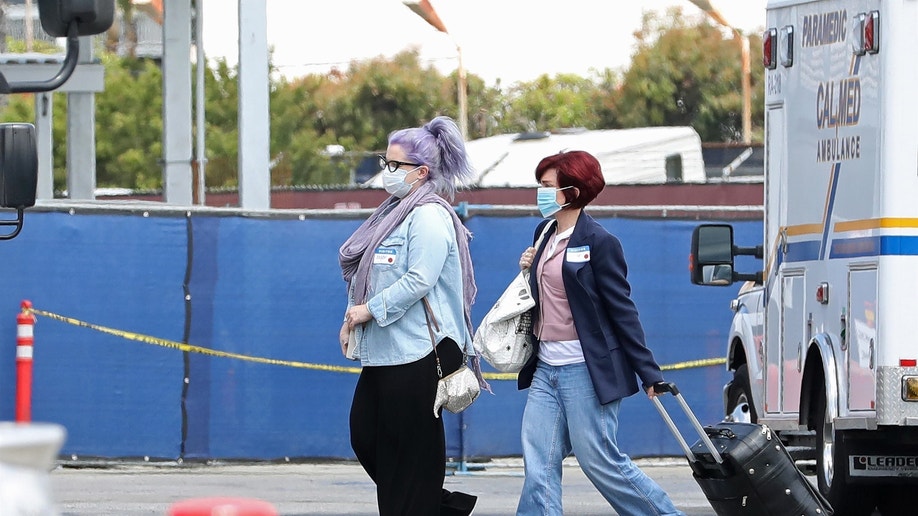 Sharon Osbourne, Kelly Osbourne outside hospital