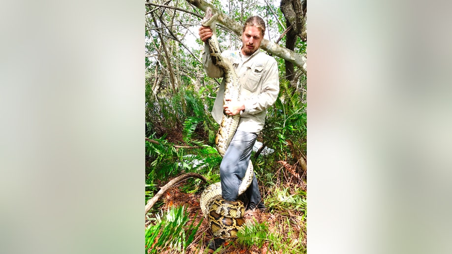 Biologist Ian Easterling with python